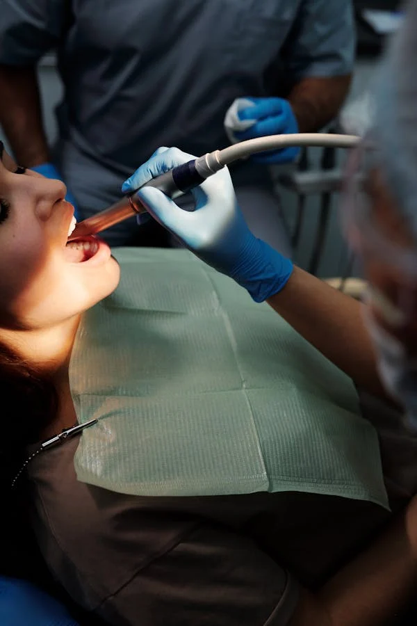 image of a woman during a dental scaling