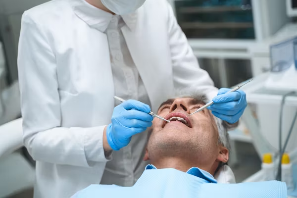 image of an elderly man during a dental treatment