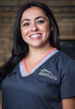 Headshot of Monica, one of our dental assistants
